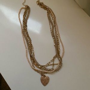 Beautiful multi-strand goldtone/yellow necklace w gold heart pendant.